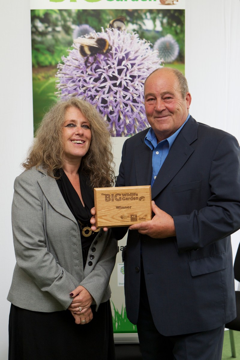 Dennis Wilkinson and Diana Cupitt collect their award for their Community entry to the RHS 'The Big Wildlife Garden' competition. photo: Andy Paradise